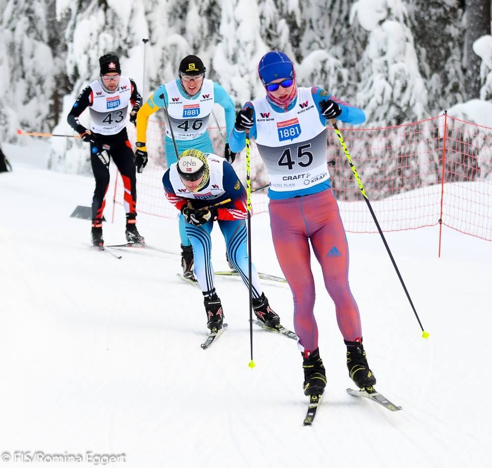Представители сборной России Иван Коноплев и Александр Пашаев в разных комбинезонах на этапе Континентального кубка; Рена 2018